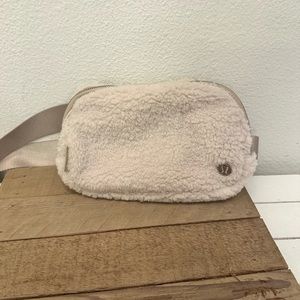 Lululemon Sherpa/Fleece Everywhere Belt Bag, 1L. With Silver Logo and buckle.